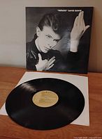 Front of Bowie “Heroes” jacket with vinyl on inner sleeve