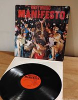 Front of outer sleeve and vinyl record