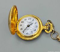 Open hunter case showing dial marked Picard 17 Jewels, subsidiary seconds, gold tone edge