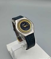 Front view of Vihan men’s quartz watch on stand