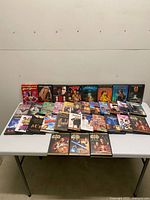 Overall view of entire DVD lot on table