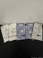 All five packaged shirts lined up