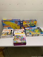 All six boxed items arranged on table