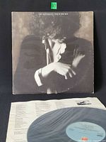 Front jacket, inner sleeve, record visible