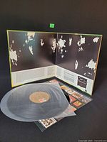 Gatefold open with vinyl and inner sleeve visible