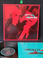 Front album cover showing artist and title