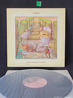 Front jacket of Genesis Selling England by the Pound with record partially visible