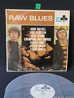 Front sleeve of Raw Blues LP and record label