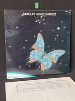 Front of outer jacket with cosmic butterfly artwork