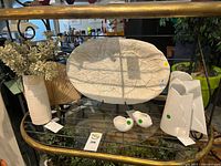 Shelf view showing all six porcelain pieces