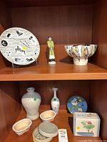 All items on two shelves showing relative sizes and group