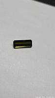 Rectangular emerald-cut green tourmaline front view