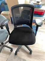 Black mesh office chair front view