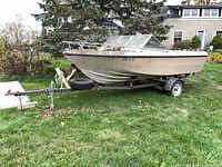 Full view of boat on trailer