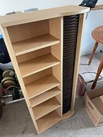 Front angled view showing shelves and CD slot section