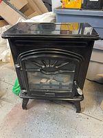 Front view of black electric fireplace heater