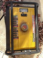 Top view showing fuel tank, gauge, cap, decals, roll cage