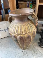 Front view showing overall shape, handles and glaze