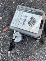 Sandblaster unit with attached label showing specifications