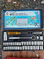 Open Superior 40-piece socket set showing sockets, ratchet, screwdriver handle, extension and adapter in case