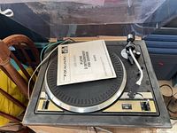 Turntable top view with manual on platter