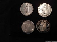 Fronts of four Canadian dollar coins