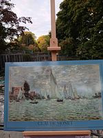 Front view of Monet poster reproduction on easel