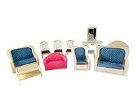 All eleven dollhouse furniture pieces arranged together