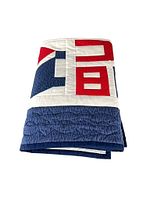 Quilt folded showing block and border fabrics