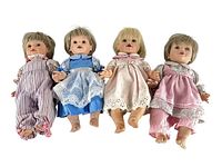 Group shot of four Baby So Beautiful dolls in various outfits