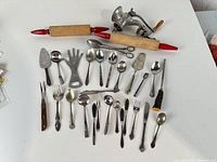 Group shot of all 28 pieces laid out on white background