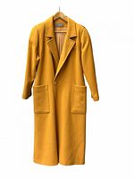 Front view of mustard wool overcoat showing lapels, single button and patch pockets