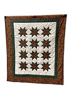 Full view of front showing star block pattern and borders