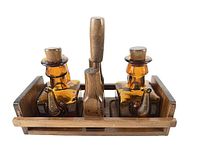 Front view of complete cruet set in wooden carrier