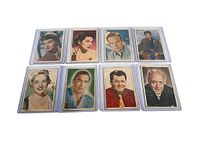 Front view of all eight sleeved cards