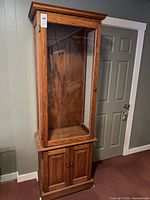 full view of curio cabinet front and side