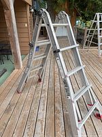 Full view of A-frame ladder standing open on deck