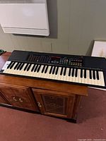 Top view of entire Kawai FS680 keyboard on cabinet