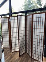 Both Shoji screens fully extended showing four panels each