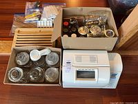 Bread maker, two boxes of glass jars visible