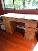Full view of desk showing top, both drawer pedestals and kneehole