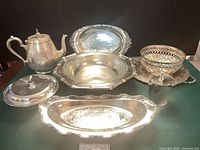 Group shot angled view of all silver-plated pieces