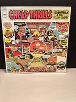 Front sleeve with comic artwork and album details