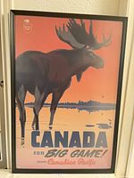 Full view of framed Canadian Pacific moose travel poster