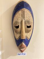 Front view of carved wooden mask