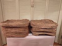 Front view of two woven baskets side by side