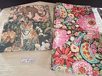 Four table runners laid out showing patterns