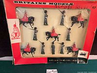 Full front view of boxed Britains Models set showing all figures
