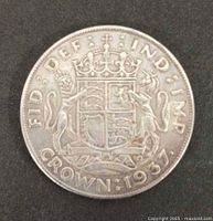 Reverse of 1937 George VI crown showing crowned arms, lion and unicorn