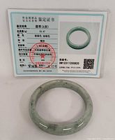 Certificate front showing image and data of the jadeite bangle